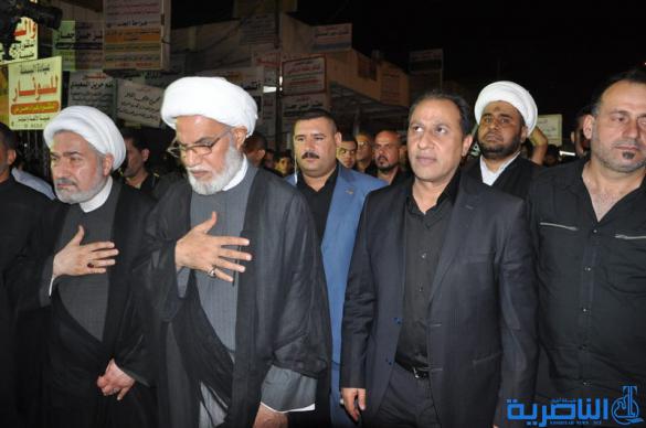 بالصور:المواكب الحسينية في ليلة التاسع من المحرم في الناصرية