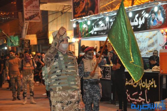 بالصور:احياء ذكرى ليلة التاسع من المحرم في مدينة الناصرية