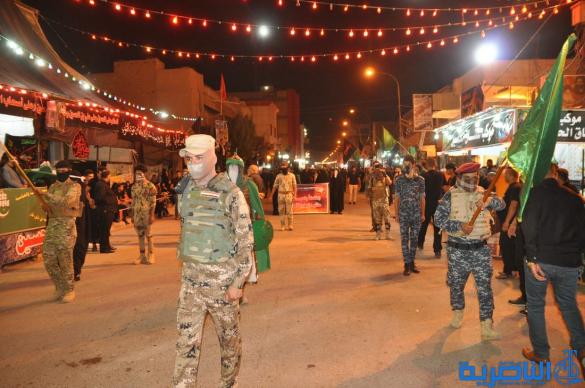 بالصور:احياء ذكرى ليلة التاسع من المحرم في مدينة الناصرية
