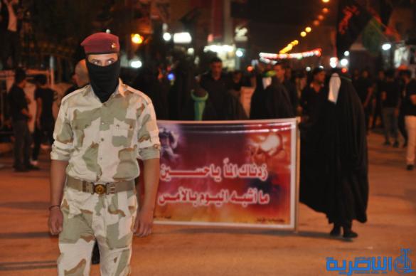 بالصور:احياء ذكرى ليلة التاسع من المحرم في مدينة الناصرية