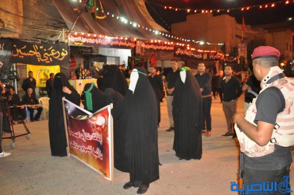 بالصور:احياء ذكرى ليلة التاسع من المحرم في مدينة الناصرية