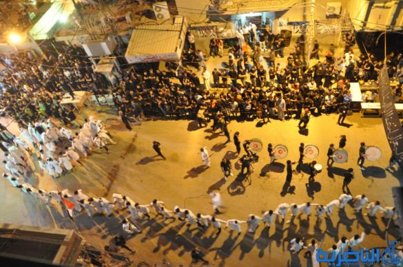 بالصور:المواكب الحسينية في الناصرية تحيي ذكرى ليلة السابع من المحرم 