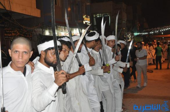 بالصور:المواكب الحسينية في ليلة التاسع من المحرم في الناصرية