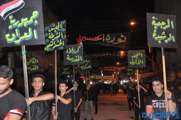 بالصور:المواكب الحسينية في ليلة التاسع من المحرم في الناصرية