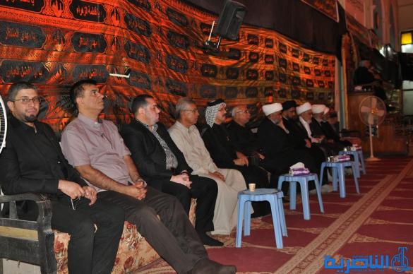 بالصور:احياء ذكرى ليلة التاسع من المحرم في مدينة الناصرية