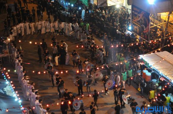 بالصور:احياء ذكرى ليلة التاسع من المحرم في مدينة الناصرية