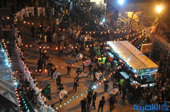 بالصور:احياء ذكرى ليلة التاسع من المحرم في مدينة الناصرية