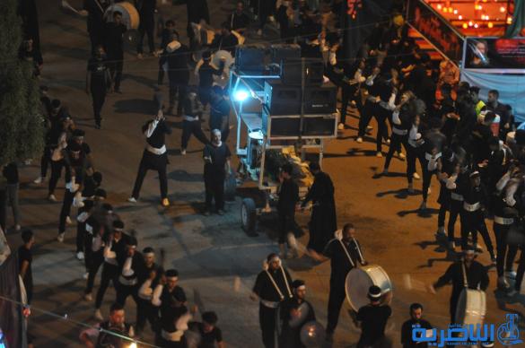 بالصور:احياء ذكرى ليلة التاسع من المحرم في مدينة الناصرية