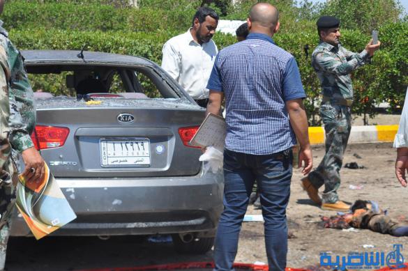 صور مروعة لتفجير الناصرية الارهابي