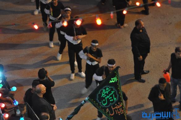 بالصور:احياء ذكرى ليلة التاسع من المحرم في مدينة الناصرية
