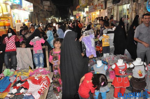 بالصور : اسواق الناصرية لا تنام الليل ، ودكاكينها عامرة بهدايا العيد