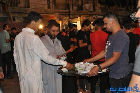 بالصور:احياء ذكرى ليلة التاسع من المحرم في مدينة الناصرية