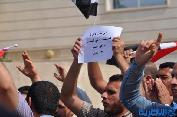 الاجراء في صحة ذي قار يتظاهرون لحسم ملف تعينهم   - تقرير مصور -