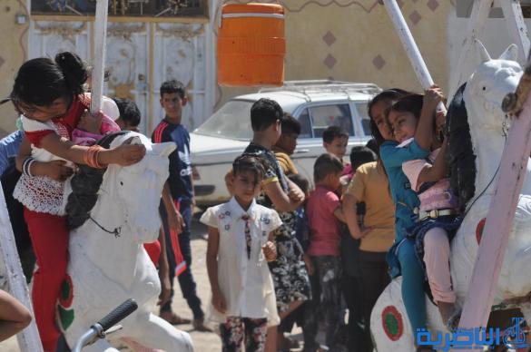 بالصور:مظاهر اول ايام عيد الفطر في مدينة الناصرية