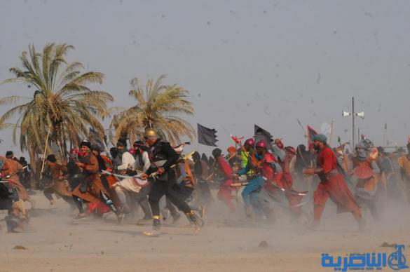 بالصور:الناصرية تحيي ذكرى عاشوراء بعرض تشابيه لواقعة الطف