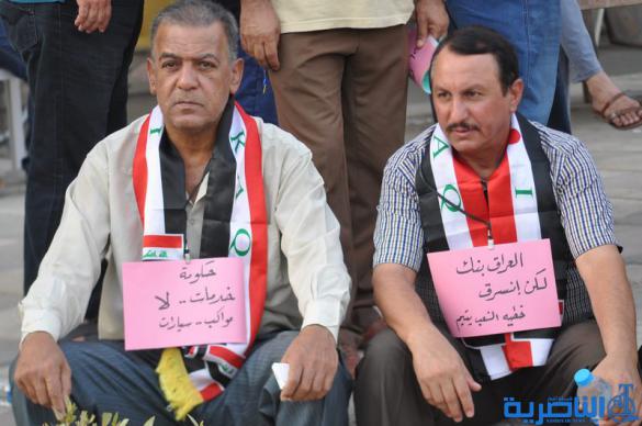 بالصور : المئات يتظاهرون في الناصرية للمطالبة  بالمزيد من الاصلاحات