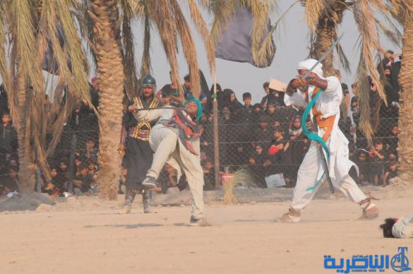 بالصور:الناصرية تحيي ذكرى عاشوراء بعرض تشابيه لواقعة الطف