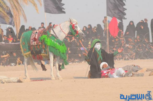 بالصور:الناصرية تحيي ذكرى عاشوراء بعرض تشابيه لواقعة الطف