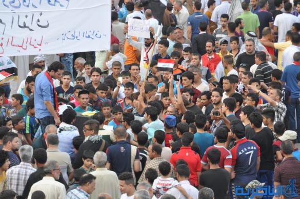 بالصور : المئات يتظاهرون في الناصرية للمطالبة  بالمزيد من الاصلاحات