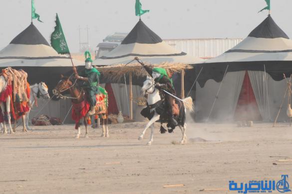 بالصور:الناصرية تحيي ذكرى عاشوراء بعرض تشابيه لواقعة الطف
