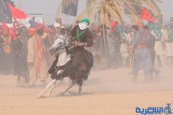 بالصور:الناصرية تحيي ذكرى عاشوراء بعرض تشابيه لواقعة الطف