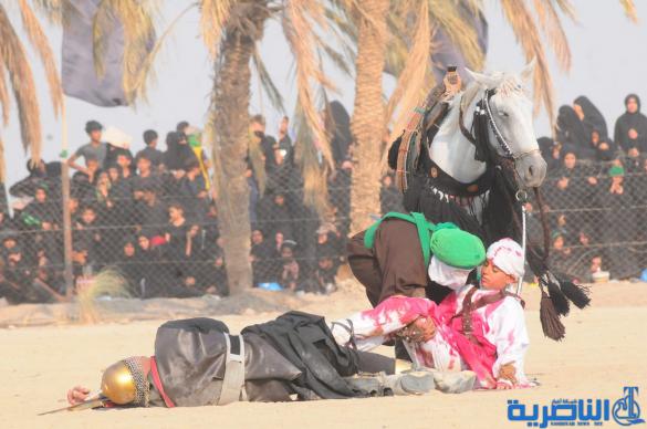 بالصور:الناصرية تحيي ذكرى عاشوراء بعرض تشابيه لواقعة الطف