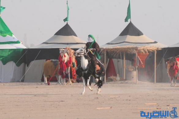 بالصور:الناصرية تحيي ذكرى عاشوراء بعرض تشابيه لواقعة الطف