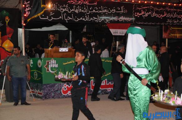  بالصور : شارع الحبوبي يتزين بمواكب العزاء في ليلة الثامن من محرم الحرام   