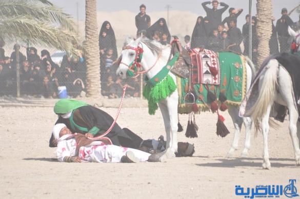 بالصور:الناصرية تنظم عرض لتشابيه واقعة الطف في يوم العاشر من شهر محرم