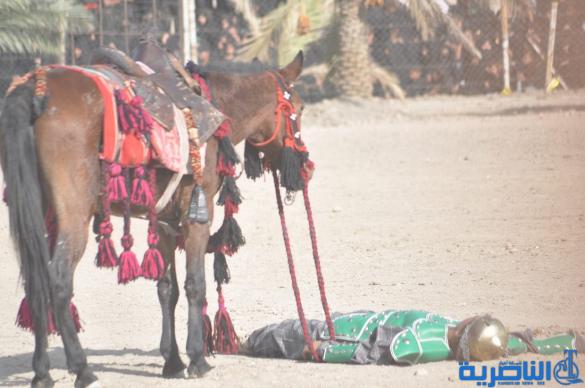 بالصور:الناصرية تنظم عرض لتشابيه واقعة الطف في يوم العاشر من شهر محرم
