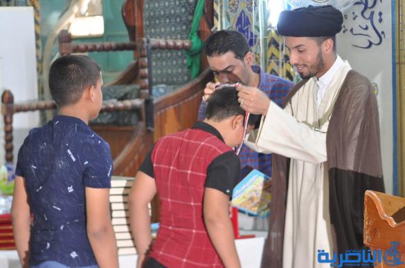 الناصرية :مدارس الامام الصادق تختتم دورتها الـ 14 بتخرج 1500 طالب - تقرير مصور -