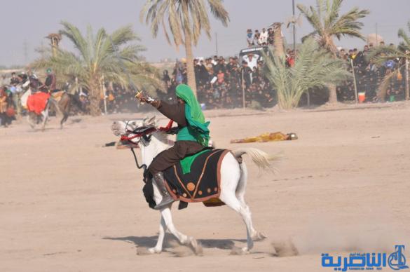بالصور:الناصرية تنظم عرض لتشابيه واقعة الطف في يوم العاشر من شهر محرم
