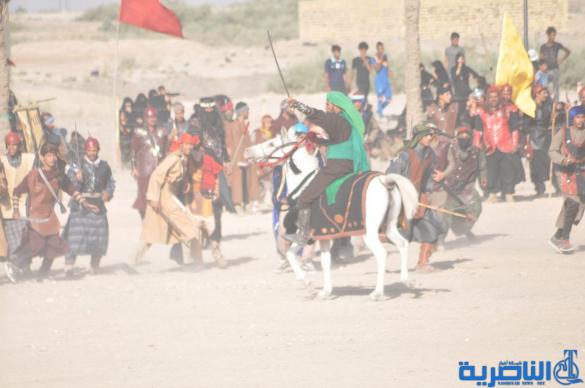 بالصور:الناصرية تنظم عرض لتشابيه واقعة الطف في يوم العاشر من شهر محرم
