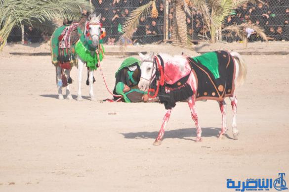 بالصور:الناصرية تنظم عرض لتشابيه واقعة الطف في يوم العاشر من شهر محرم