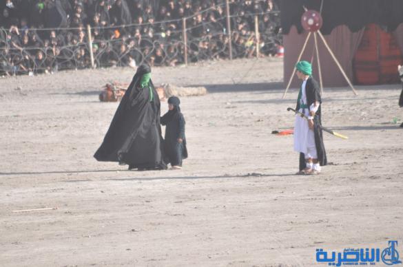 بالصور:الناصرية تنظم عرض لتشابيه واقعة الطف في يوم العاشر من شهر محرم