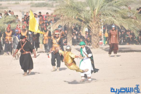 بالصور:الناصرية تنظم عرض لتشابيه واقعة الطف في يوم العاشر من شهر محرم