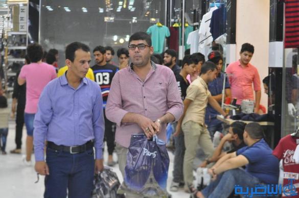 بالصور : اسواق الناصرية لا تنام استعدادا لعيد الفطر المبارك  