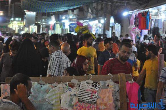 بالصور : اسواق الناصرية لا تنام استعدادا لعيد الفطر المبارك  
