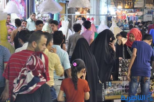 بالصور : اسواق الناصرية لا تنام استعدادا لعيد الفطر المبارك  