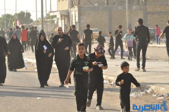 بالصور:الناصرية تنظم عرض لتشابيه واقعة الطف في يوم العاشر من شهر محرم