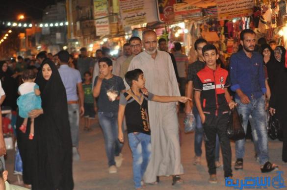 بالصور : اسواق الناصرية لا تنام استعدادا لعيد الفطر المبارك  