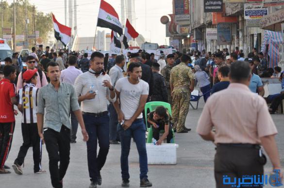 شرطة ذي قار تعزز اجراءاتها الامنية قرب الحبوبي لتامين المتظاهرين - تقرير مصور -