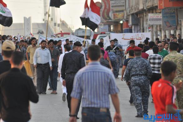 شرطة ذي قار تعزز اجراءاتها الامنية قرب الحبوبي لتامين المتظاهرين - تقرير مصور -