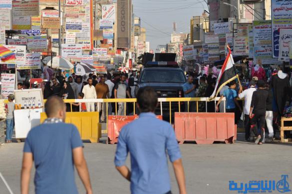 شرطة ذي قار تعزز اجراءاتها الامنية قرب الحبوبي لتامين المتظاهرين - تقرير مصور -