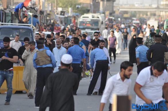 شرطة ذي قار تعزز اجراءاتها الامنية قرب الحبوبي لتامين المتظاهرين - تقرير مصور -