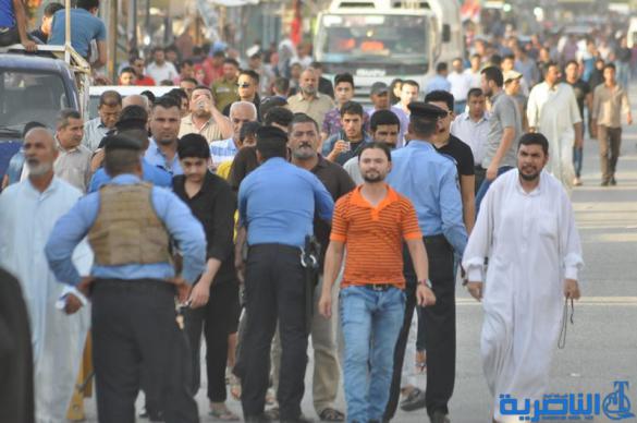 شرطة ذي قار تعزز اجراءاتها الامنية قرب الحبوبي لتامين المتظاهرين - تقرير مصور -