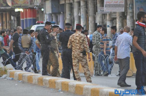 شرطة ذي قار تعزز اجراءاتها الامنية قرب الحبوبي لتامين المتظاهرين - تقرير مصور -