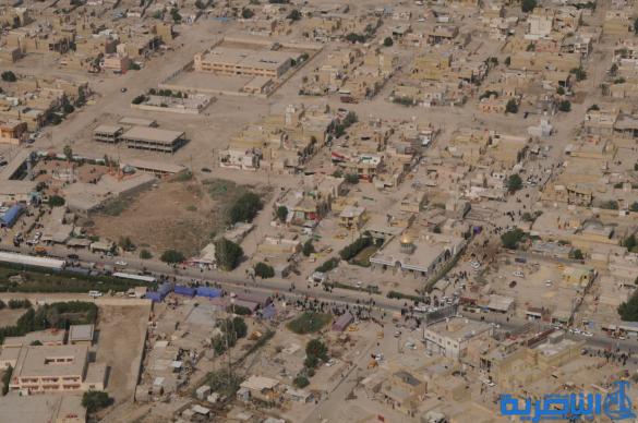 تصوير من الجو لحركة جموع الزائرين نحو كربلاء 