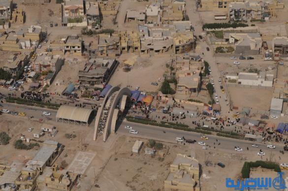 تصوير من الجو لحركة جموع الزائرين نحو كربلاء 