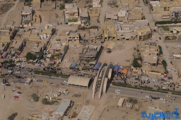 تصوير من الجو لحركة جموع الزائرين نحو كربلاء 